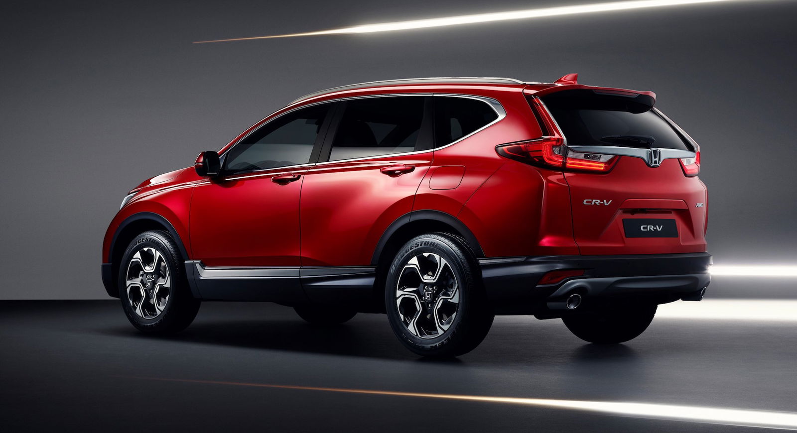 Honda CR-V rosso laterale statica