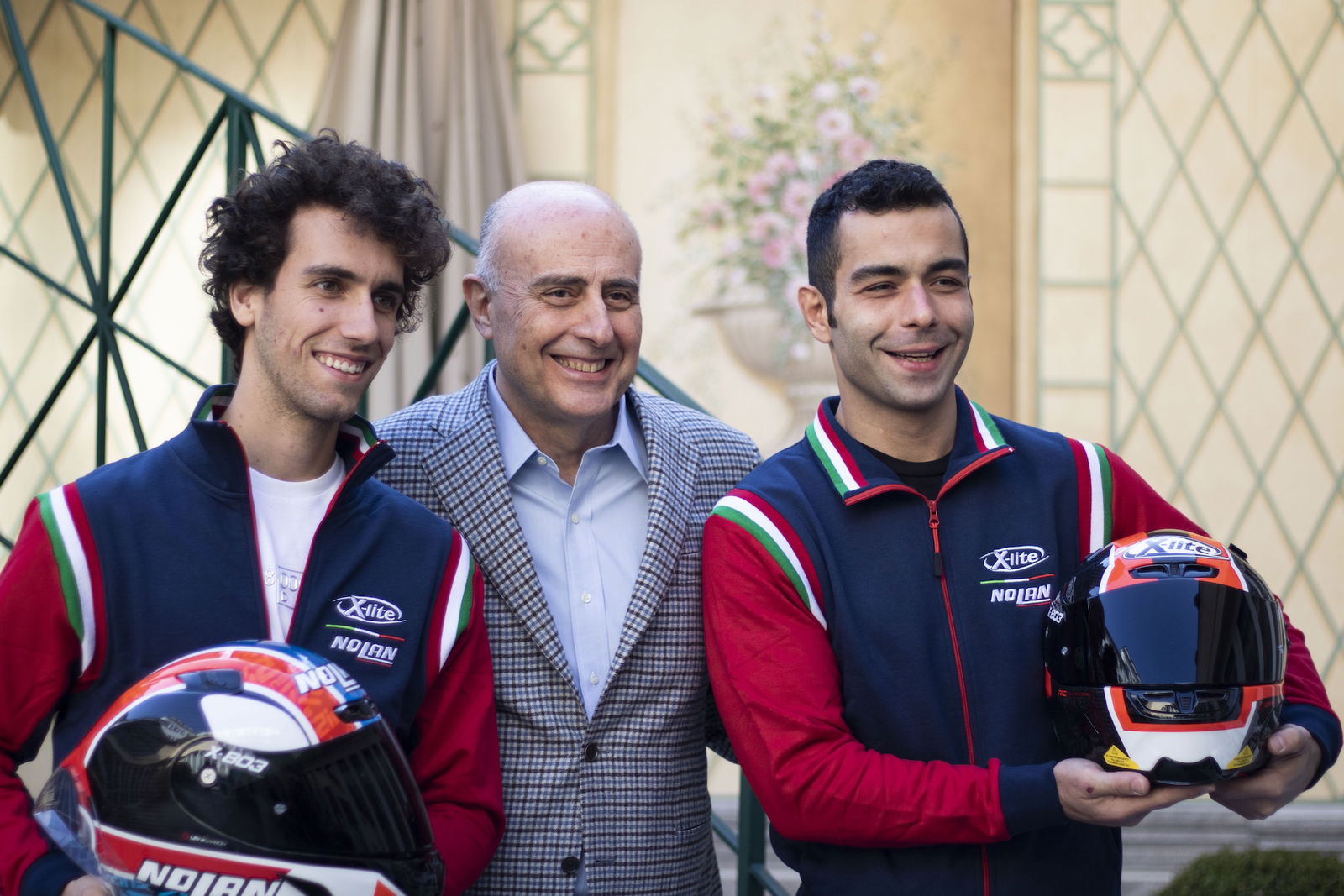 Petrucci e Rins con l'amministratore delegato di Nolan Group Panacci